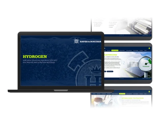 A laptop displaying the cover page of the Engineer's Guide with the title “Hydrogen,” with screenshots of the content in the background.